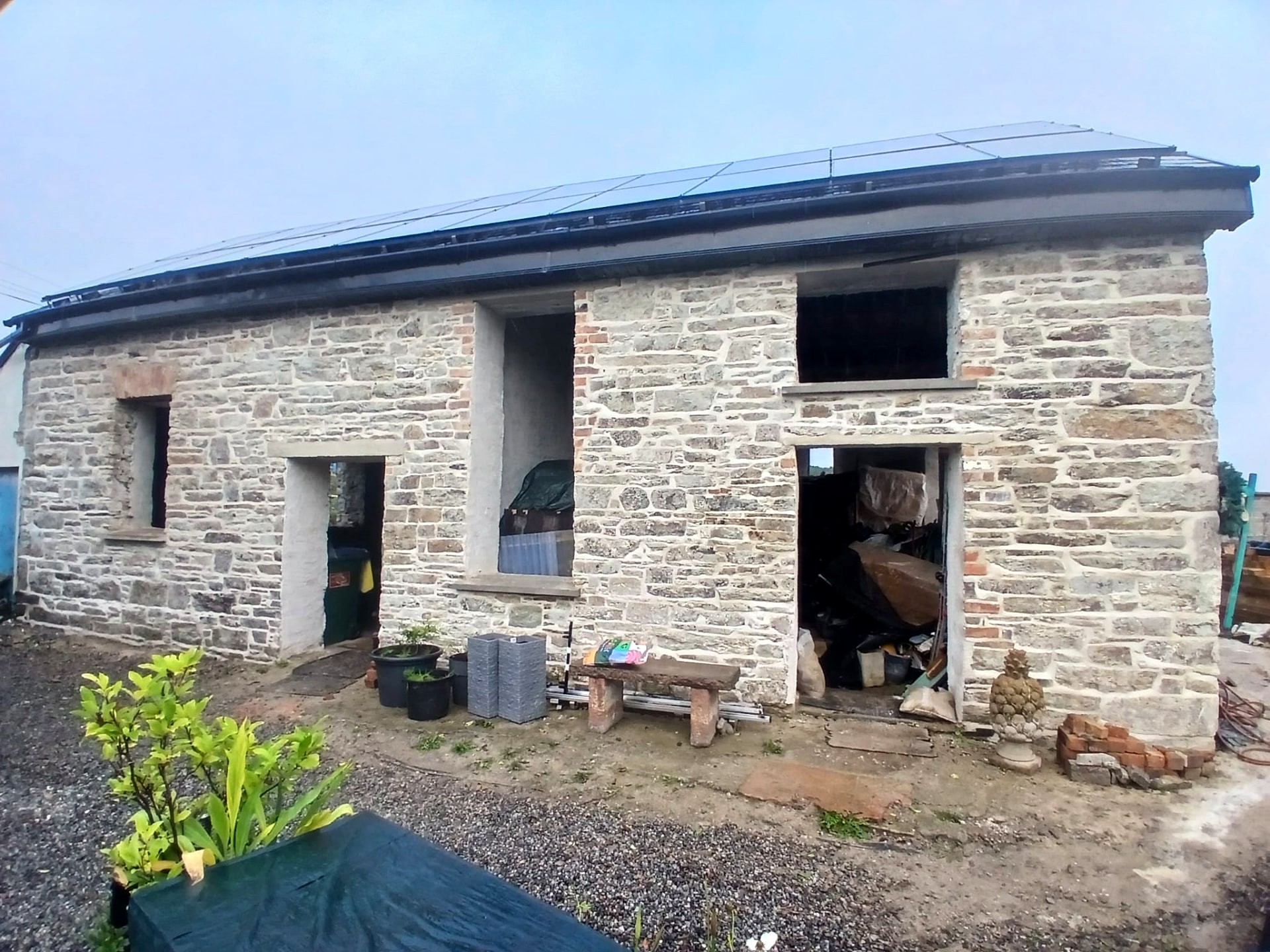 Long stone outbuilding conversion fully lime pointed, with new openings