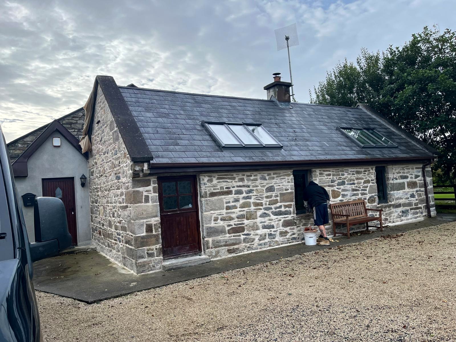 Traditional stone cottage with slate roof after full lime repointing